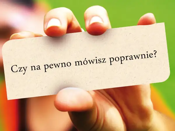 Dłoń trzyma kartkę z napisem "Czy na pewno mówisz poprawnie?". Czy to półtora czy półtorej?