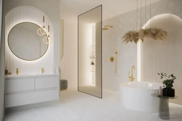 Nowoczesna łazienka z wolnostojącą wanną i podwójną umywalką. Złote baterie i dekoracje dodają elegancji. Idealna inspiracja, jaka umywalka do łazienki.