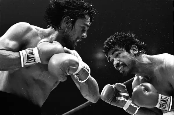 Roberto Duran in a fierce boxing match, a moment captured from his legendary roberto duran fights list.