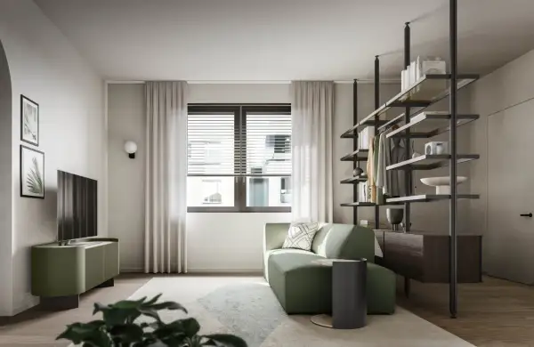 Divano angolare e mobile TV in un rilassante verde salvia colore, con scaffalatura a vista e un'elegante porta.