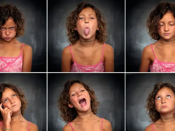 Seis caras de una niña muestran diversas emociones infantiles: enfado, burla, calma, reflexión, sorpresa y anhelo.