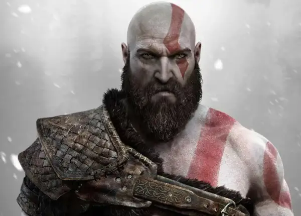 Kratos, bóg wojny z greckiej mitologii, z groźnym spojrzeniem i charakterystycznym czerwonym znakiem na twarzy.