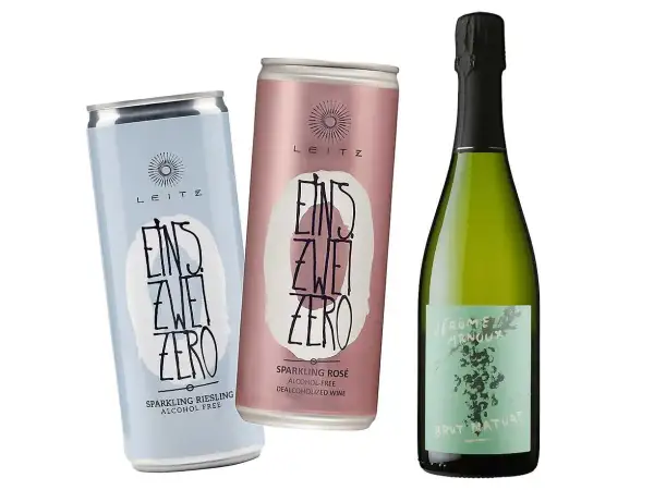 Två burkar alkoholfritt mousserande vin och en flaska vin. Perfekt vin till lax, oavsett om du väljer Riesling eller Rosé.