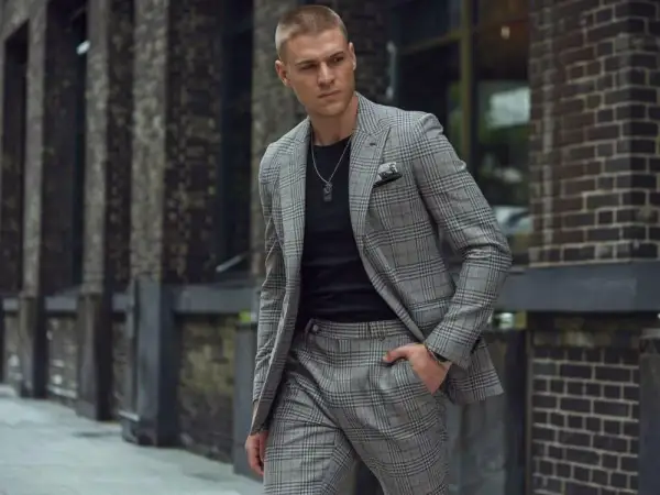 Jak dobrać marynarkę do szarych spodni w kratę? Stylowe porady
