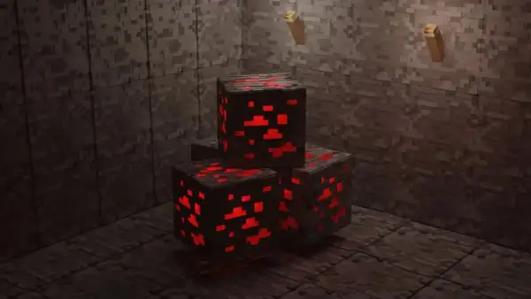 Bloki rudy czerwonego kamienia w kopalni. Idealne, by zastanowić się, jaki silnik do serwera Minecraft wybrać, by działał równie wydajnie.