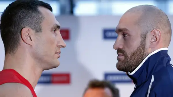 Two boxers, Vladimir Klitschko and Tyson Fury, face off before their fight.
