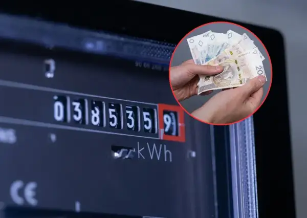 Liczniki energii elektrycznej i polskie banknoty symbolizują rosnące ceny prądu w Polsce.