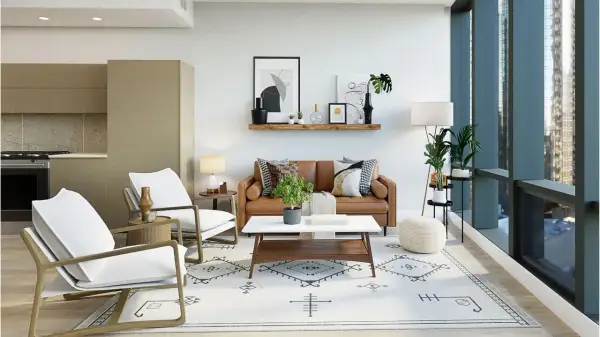 A modern traditional interior design featuring a brown leather sofa, white armchairs, and a geometric rug.