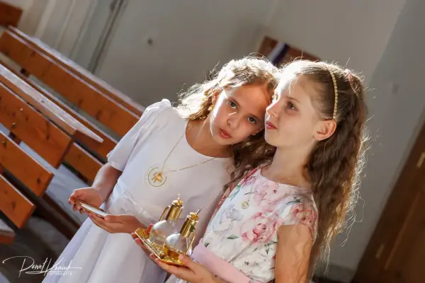 Fotograf na komunię: Uniknij pułapek! Ceny i pakiety 2024.