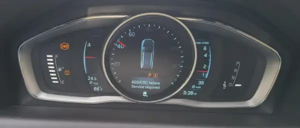 ABS/ESC-fel indikerar att esc service erfordras volvo. Varningstriangel och ABS-lampa lyser.