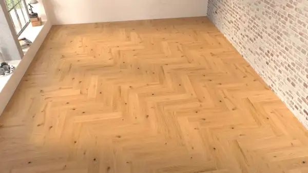 Suelo de madera con disposición en espiga, creando un patrón clásico y elegante.