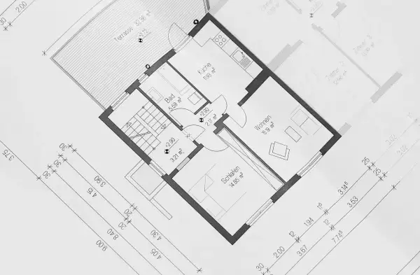 Projekt zagospodarowania terenu z widokiem na rzut parteru domu z kuchnią, salonem, sypialnią i łazienką.