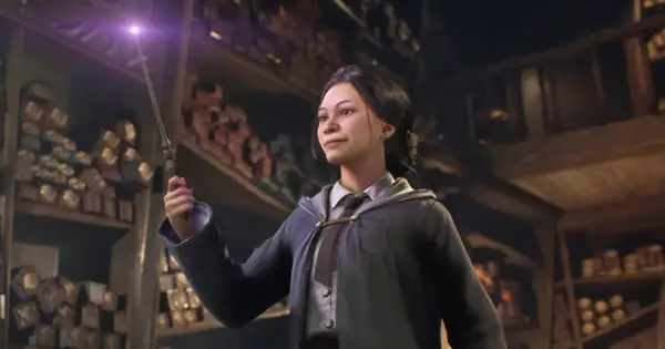 Dziewczyna z różdżką w sklepie z różdżkami, inspiracja do gry Hogwarts Legacy poradnik.