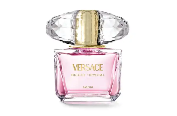Różowy flakonik perfum Versace Bright Crystal 90ml z kryształową nakrętką i złotymi detalami.
