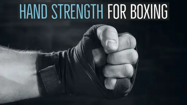 Close-up of a boxer's fist wrapped in tape, with text "HAND STRENGTH FOR BOXING" above. Learn how to strengthen wrists for boxing.