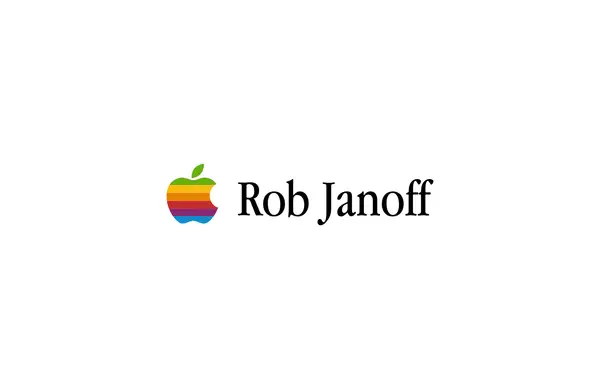 The iconic rainbow Apple logo, designed by Rob Janoff, next to his name.
