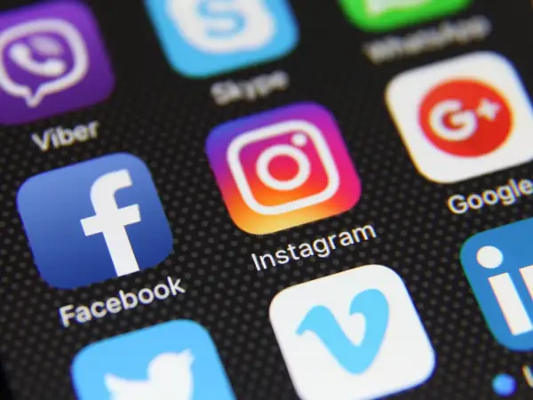 Close-up of a smartphone screen displaying various social media app icons, including Instagram, Facebook, and Viber. This image could represent the diverse digital landscape, much like a "vox etf" offers a diversified investment.