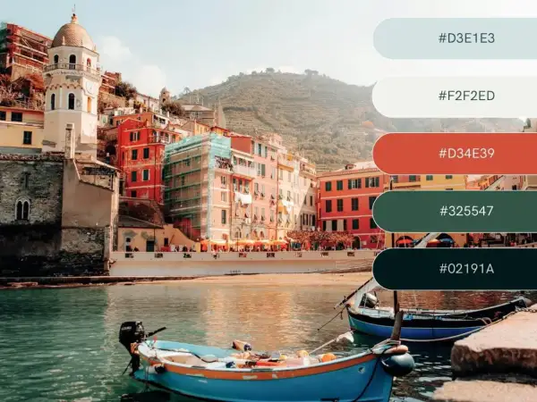 A vibrant Italian coastal town with colorful buildings and boats, showcasing a perfect vacation color palette of blues, reds, and greens.