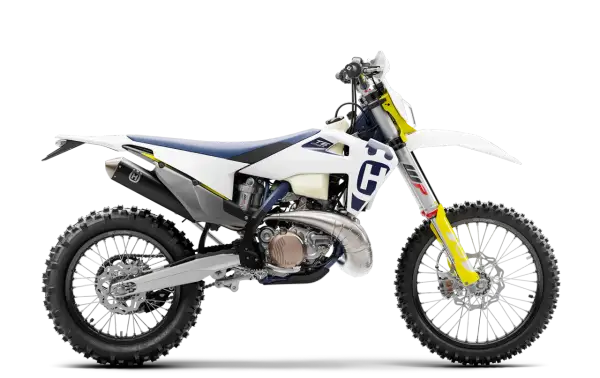 Biały motocykl Husqvarna 250 2t z niebieskim siedzeniem i żółtymi akcentami, gotowy na terenowe wyzwania.