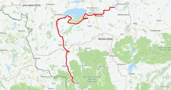Trasa rowerowa wzdłuż Wisły, widoczna na mapie jako czerwona linia, prowadzi przez malownicze tereny od Jastrzębia-Zdroju, przez Jezioro Goczałkowickie, aż po okolice Bielska-Białej.
