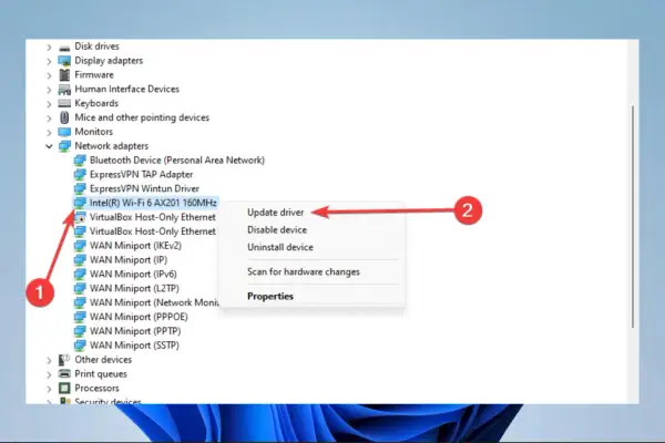 Menedżer urządzeń pokazuje, że Windows 10 nie widzi WiFi. Kliknij "Zaktualizuj sterownik" dla karty Intel(R) Wi-Fi 6 AX201 160MHz.