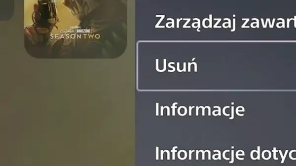 Ekran PS5 z opcją "Usuń" pod "Zarządzaj zawartością". Dowiedz się, jak odinstalować grę na PS5, wybierając tę opcję.