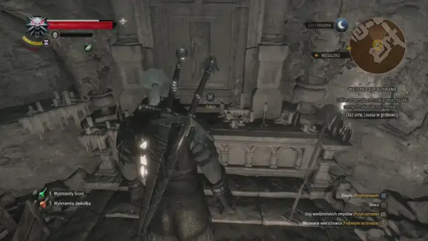 Geralt w grobowcu, szuka nagrody za rozwiązanie zagadki "wieczne odpoczywanie". W tle widać urnę i narzędzia.