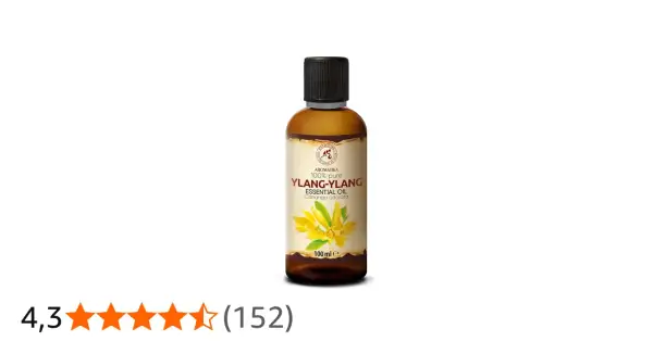 Flasche Ylang-Ylang ätherisches Öl. Die positive ylang ylang wirkung psyche kann durch den Duft gefördert werden.