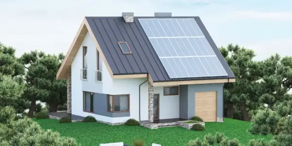 Nowoczesny dom z panelami słonecznymi na dachu. Uważaj na Columbus Energy oszuści, by nie stracić pieniędzy na fałszywych obietnicach.