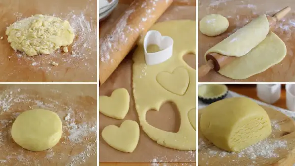 Preparazione di biscotti di pasta frolla a forma di cuore. L'impasto viene steso e tagliato con un coppapasta.