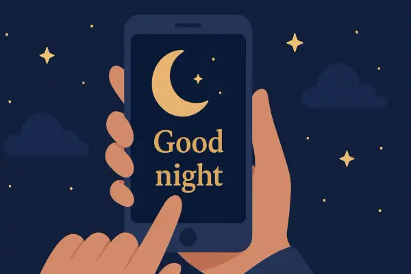Dłoń trzyma smartfon z napisem "Good night" i księżycem. Idealne życzenia na wieczór.