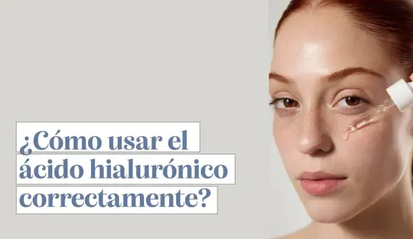 Una mujer joven recibe gotas de ácido hialurónico en su cara. El texto pregunta: "¿Cómo usar el ácido hialurónico correctamente?".