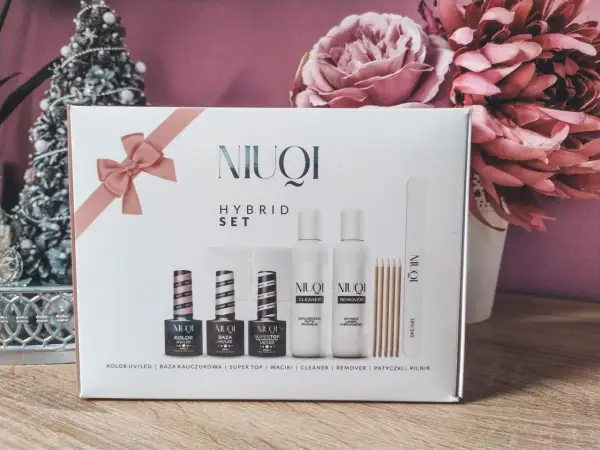 Zestaw hybrydowy Niuqi: lakier, baza, top, cleaner, remover, patyczki i pilnik. Idealny do domowego manicure.