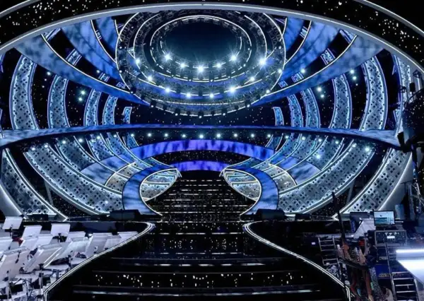 The dazzling stage for the San Remo Festival, illuminated with blue lights and starry effects, awaits its next performance.