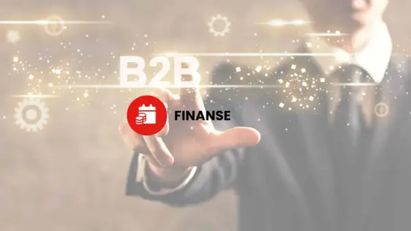 Dłoń dotyka ekranu z napisem B2B i ikoną finansów. To klucz do zrozumienia, b2b co to jest.