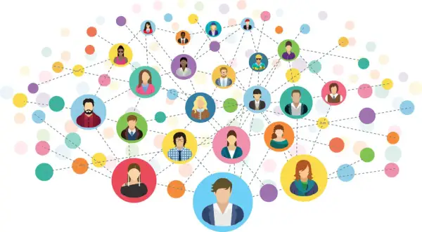 Wielobarwna sieć połączeń między ikonami ludzi symbolizuje networking i budowanie relacji.