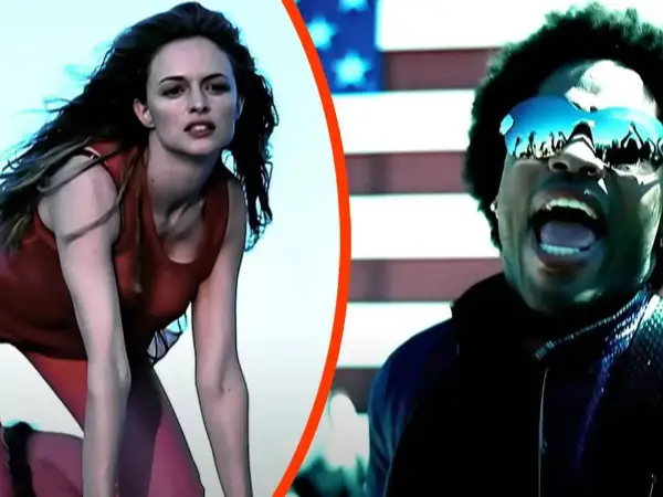 Młoda american woman w czerwonym stroju i mężczyzna w okularach na tle flagi USA.