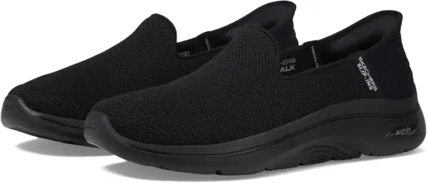 Zapatillas negras Skechers Arch Fit 2.0, cómodas y fáciles de poner, ideales para caminar.