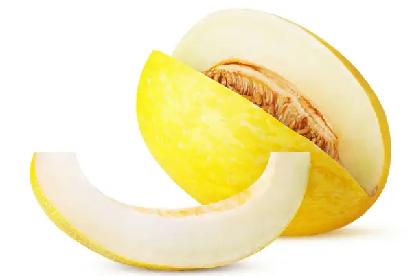 En saftig honungsmelon, skuren för att visa dess frön. Perfekt för en lätt och hälsosam snack med lågt honungsmelon kcal-innehåll.