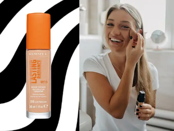 Uśmiechnięta blondynka aplikuje podkład Rimmel Lasting Radiance, który został wycofany.
