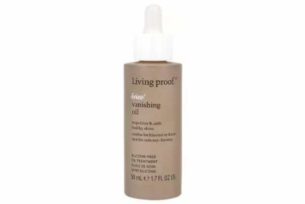 Flaska med Living Proof Frizz Vanishing Oil, en lätt olja i håret som motverkar friss och ger glans.