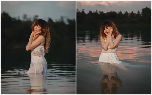 A woman in a white dress stands in water, bathed in the best light for outdoor photos during a serene sunset.