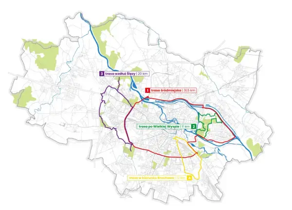 Mapa Wrocławia z zaznaczonymi trasami rowerowymi: śródmiejską (czerwona), po Wielkiej Wyspie (zielona), wzdłuż Ślęzy (fioletowa) i w kierunku Brochowa (żółta).