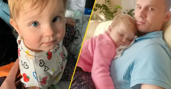 Dziecko z niebieskimi oczami i śpiące na ramieniu taty. To uroczy zespół.