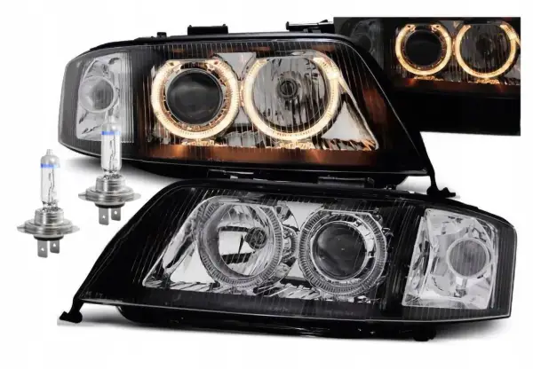 Nowe lampy do Audi A6 C5 z ringami i żarówkami.