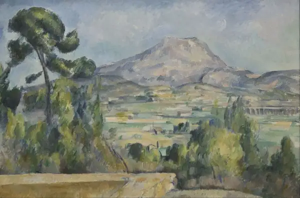 Krajobraz z widokiem na górę Świętej Wiktorii, dzieło Paula Cézanne'a. W oddali majaczy masyw górski, a na pierwszym planie bujna zieleń drzew.