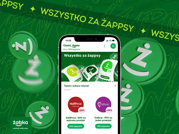 Grafika przedstawia smartfon z aplikacją Żappka, monety z logo Ż i promocje.