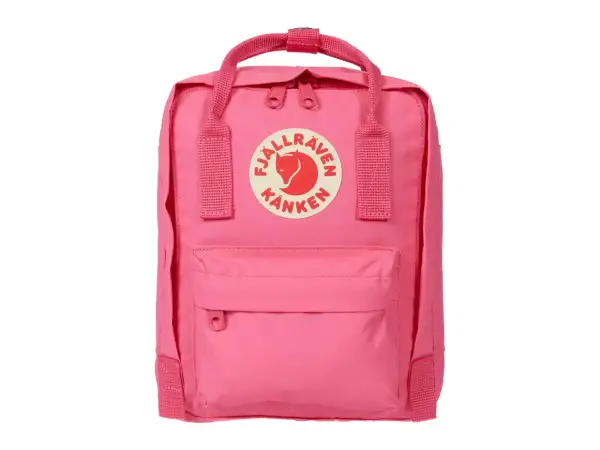A pink Fjällräven Kånken Mini backpack with the brand's circular logo on the front.