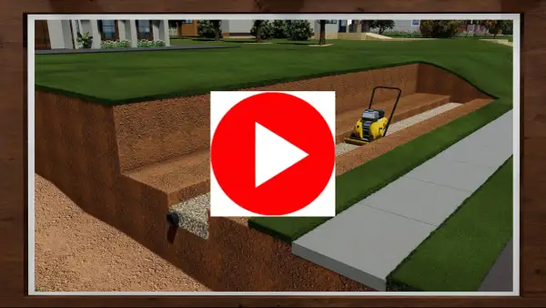 Construcción de un muro de contención con compactadora. Se ve la excavación, drenaje y preparación del terreno para un jardín y acera.