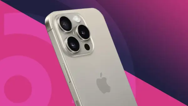 Close-up of a silver iPhone's rear camera array with three lenses and a flash, against a pink and purple gradient background.